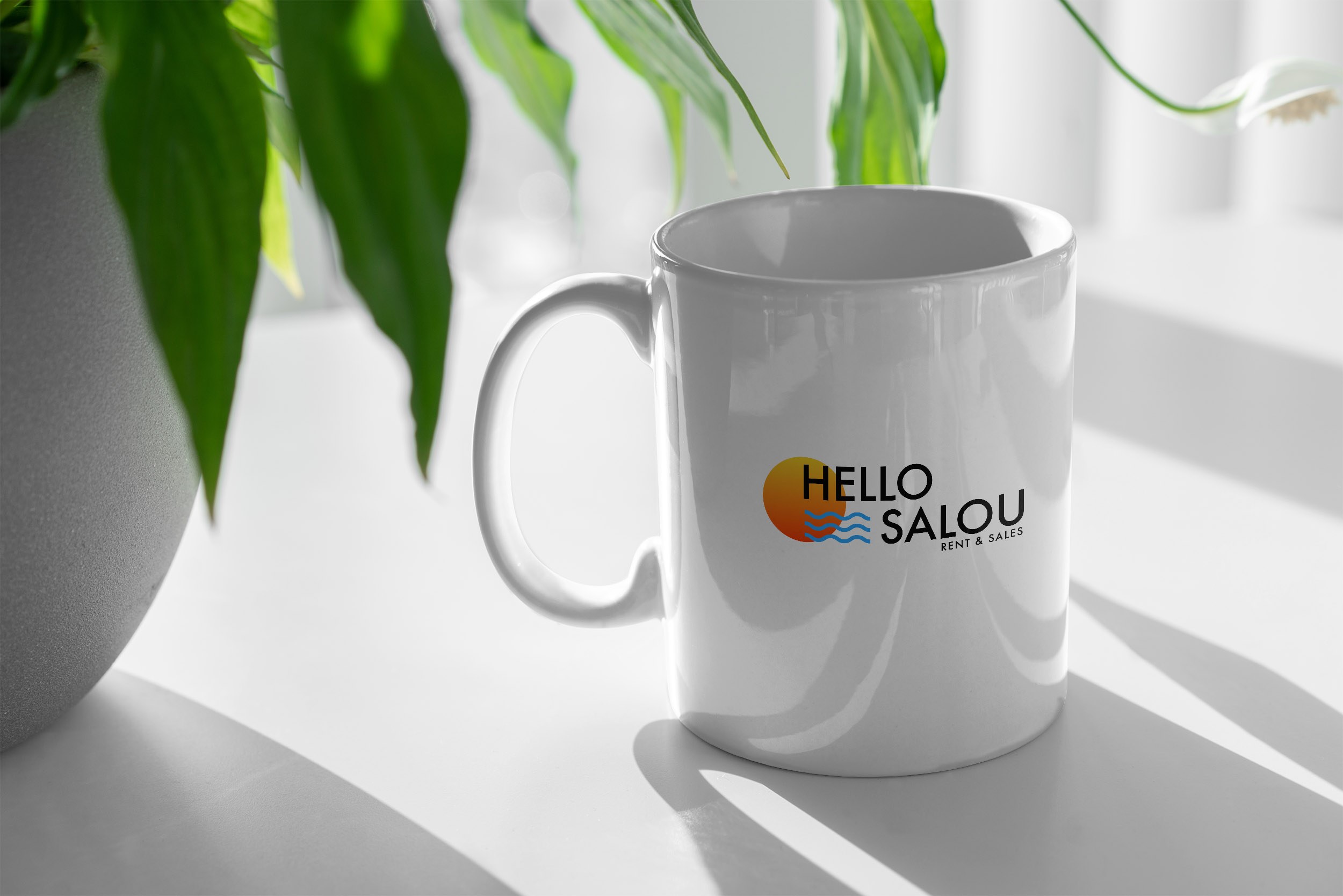 Branding y pagina web para agencia inmobiliaria Hello Salou